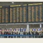 Busy airport terminal with travelers