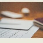 Close-up of visa application documents