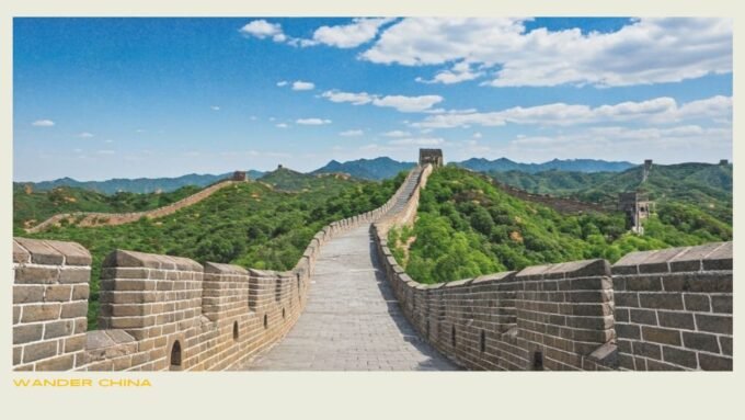 Traveler using phone at Great Wall